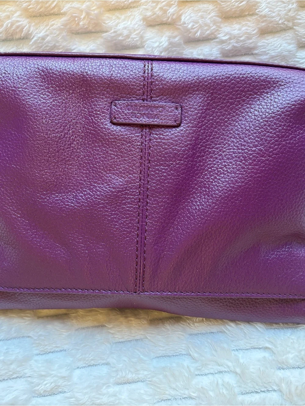 Vince Camuto pebbled purple leather Crossbody bag. Large gold ring hardware.